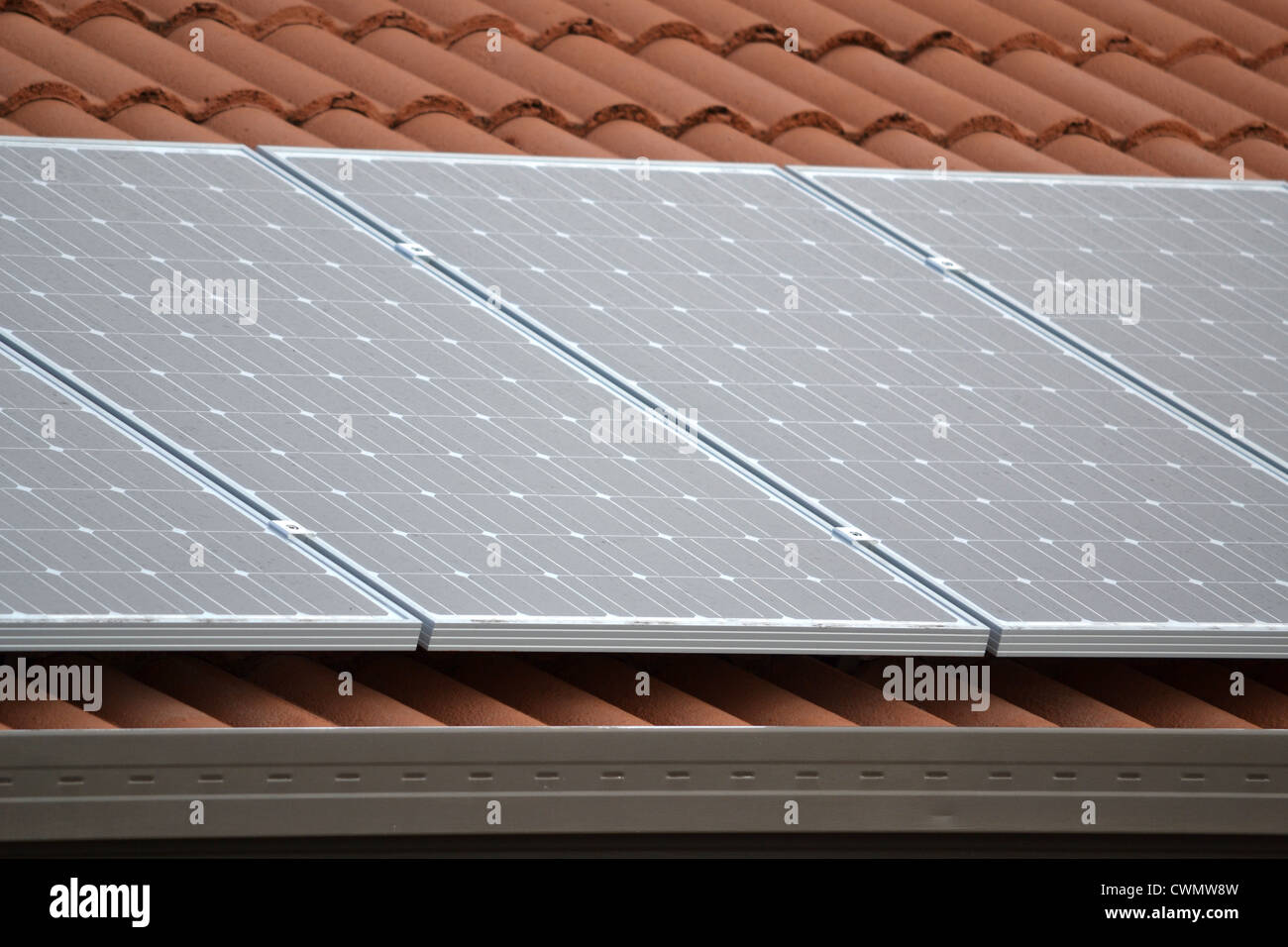 A house with solar panels installed on the roof Stock Photo Alamy