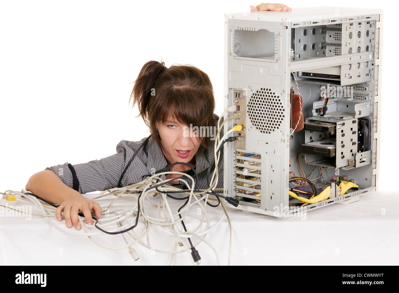 breathless business woman having problems with computer Stock Photo