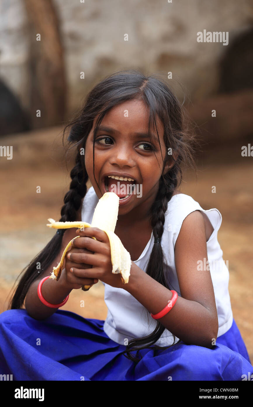 girl eating banana 