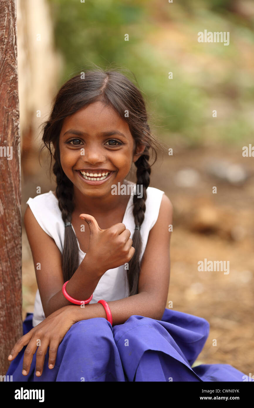 Young Indian rural girl doing a thumbs up Andhra Pradesh South India
