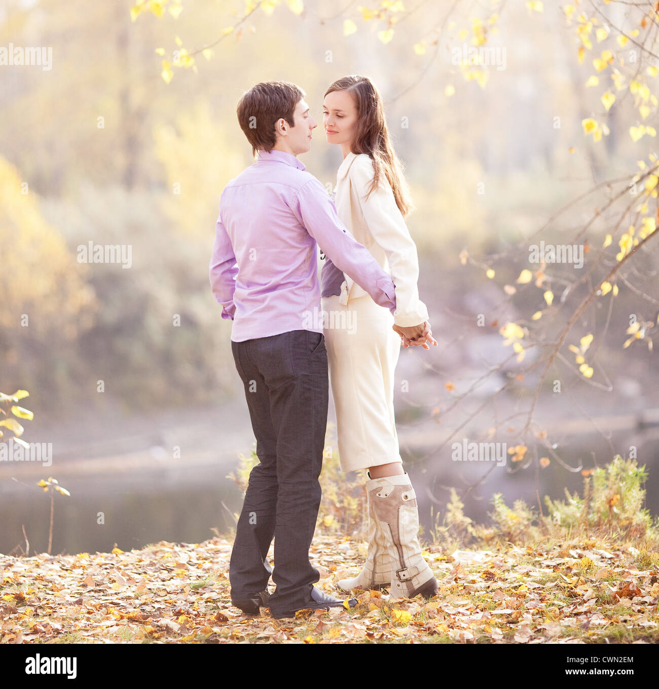 happy couple in the autumn park Stock Photo - Alamy