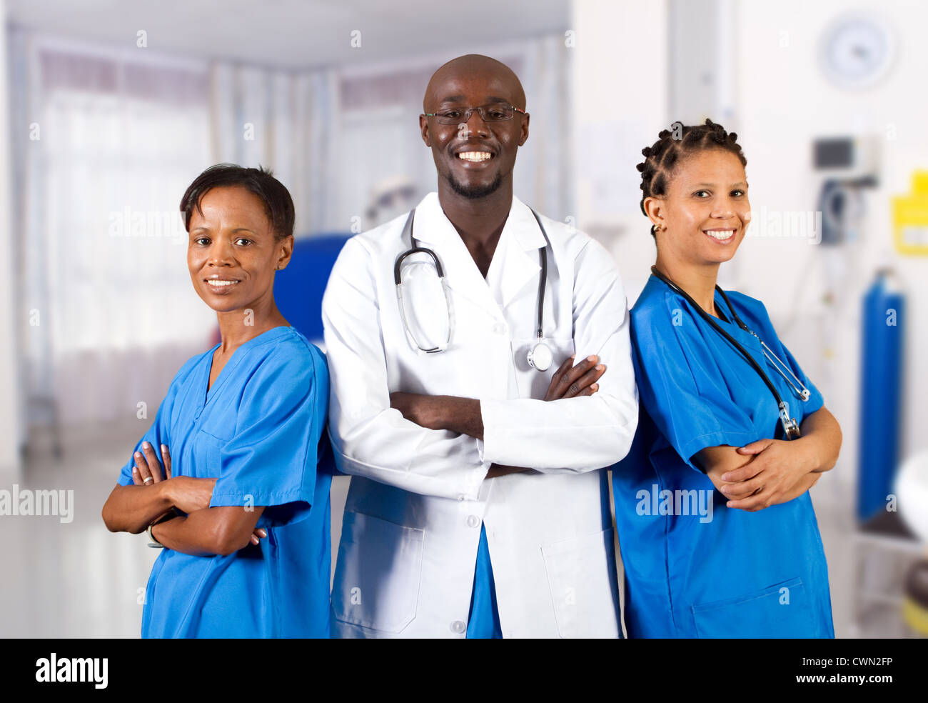 Group Of African American Doctor And Nurse In Hospital Ward Stock Photo group-of-african-american-doctor-and-nurse-in-hospital-ward-stock-photo