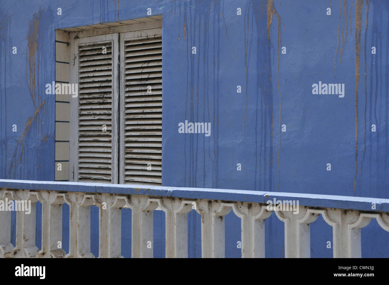Blue wall and wooden window shutter. El Palmar. Valencia. Spain Stock Photo
