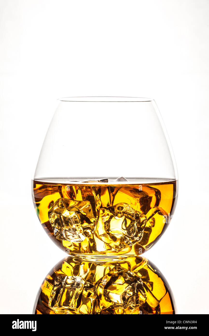 A glass of whiskey on the rocks isolated on white background Stock ...