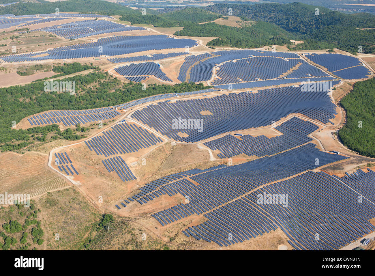 AERIAL VIEW. La Colle des Mées Solar Farm. Alpes-de-Haute-Provence, Provence, France. Stock Photo