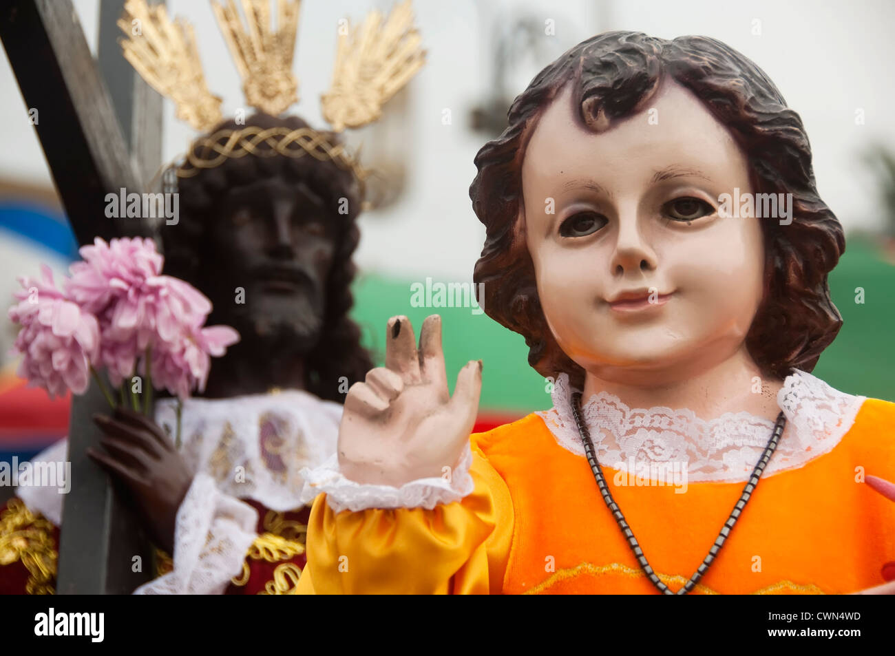 Baby Jesus with the Black Nazarene during the celebration of the Feast