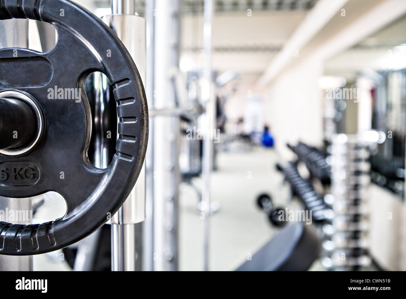 diverse equipment and machines at the gym room Stock Photo Alamy