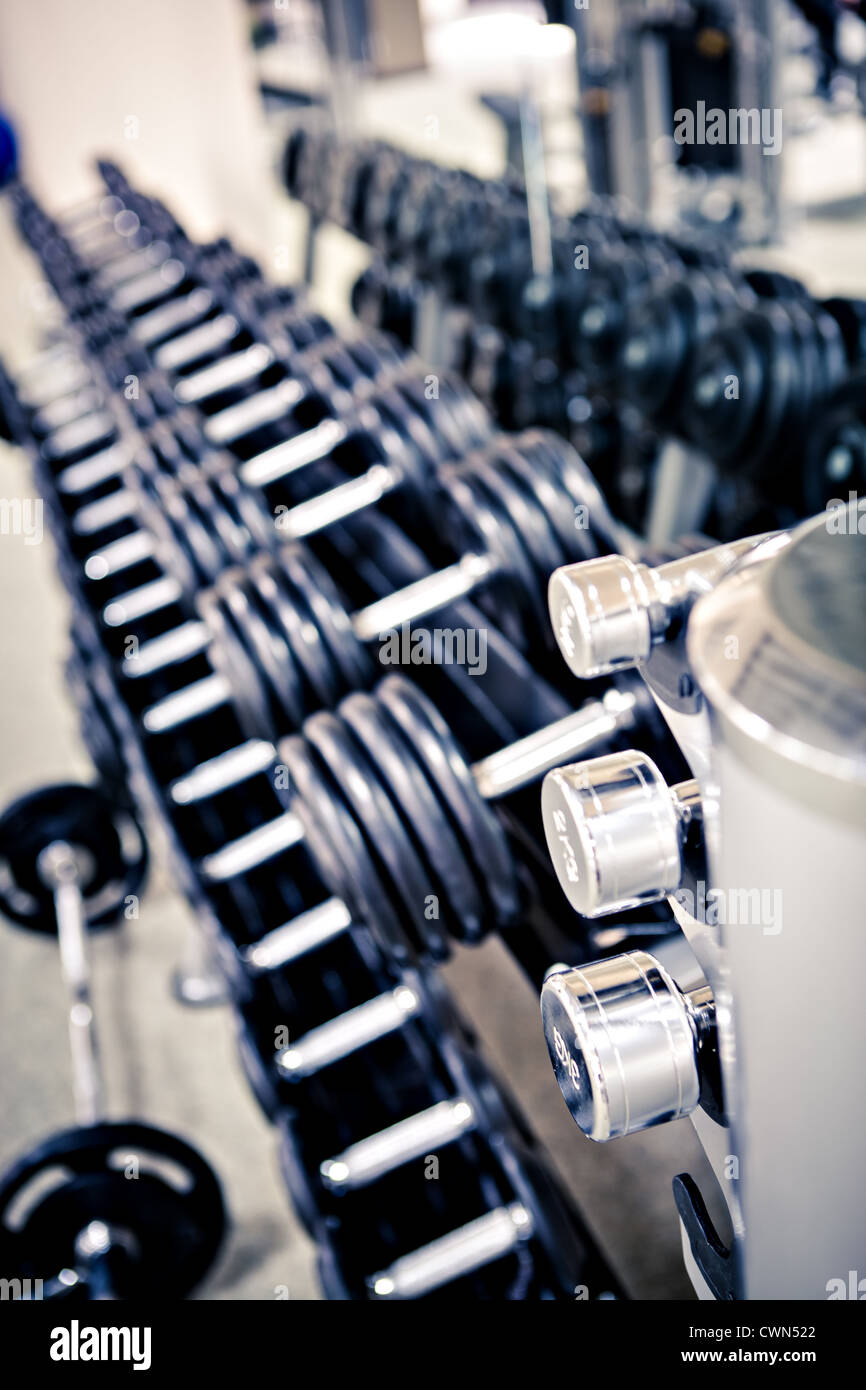 diverse equipment and machines at the gym room Stock Photo Alamy