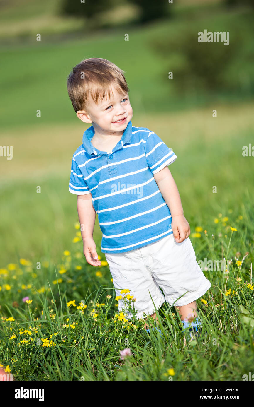 outdoor portrait of a little boy on the meadow Stock Photo - Alamy