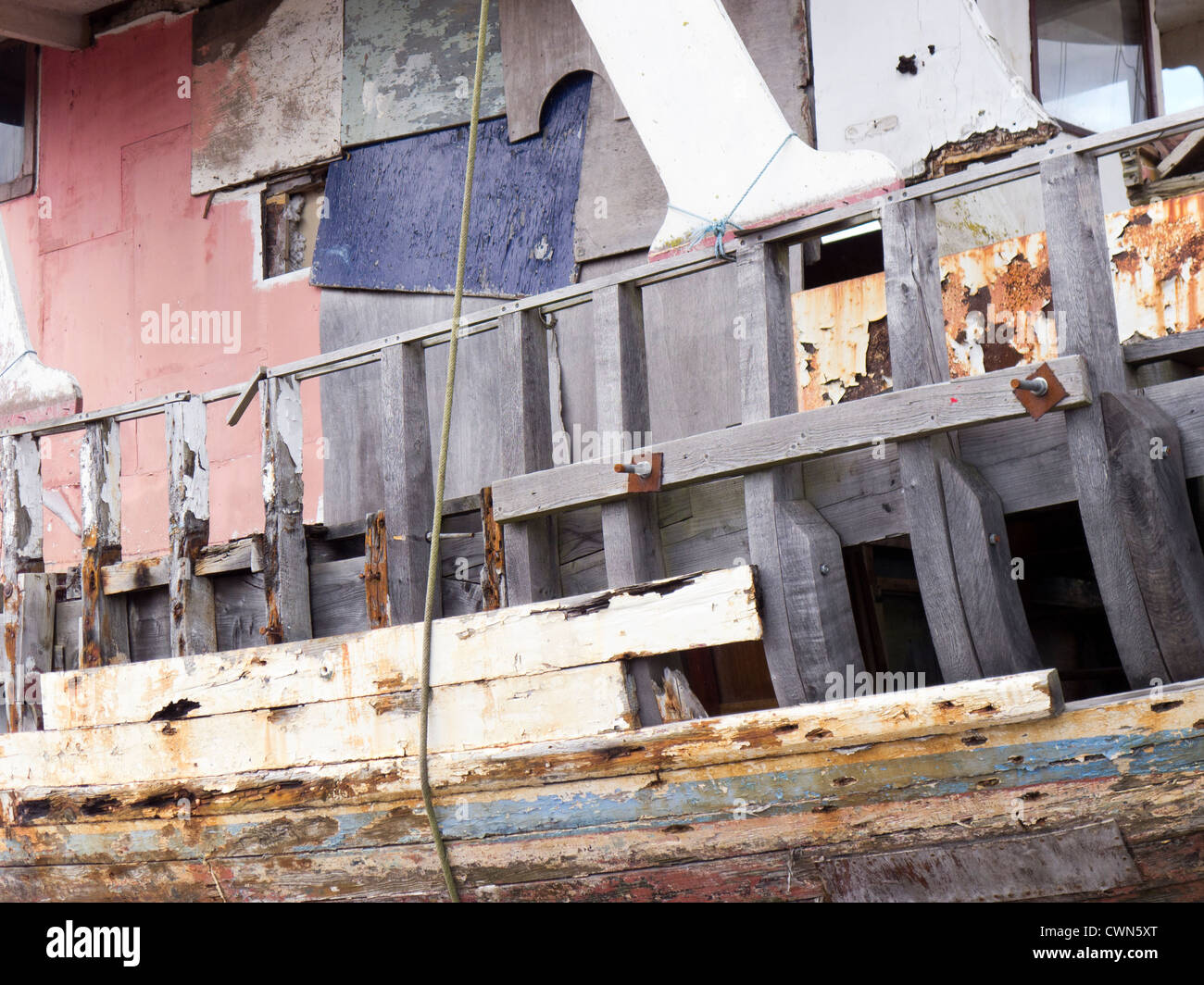Wooden boat in need of major renovation. Stock Photo