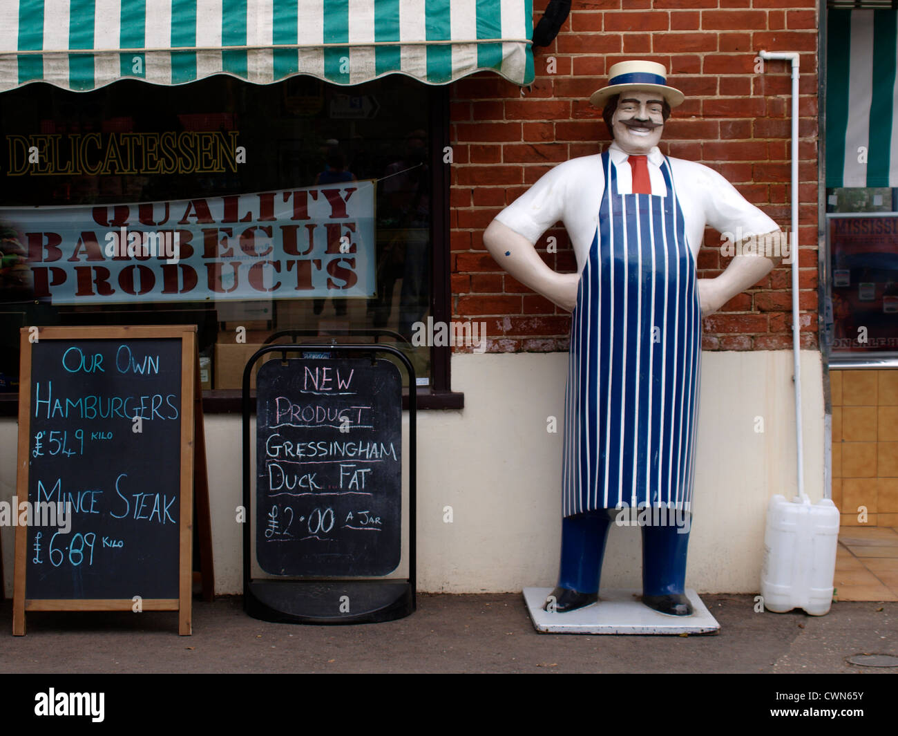 Butchers Mannequin, Outside traditional butchers shop, Norfolk, UK Stock Photo