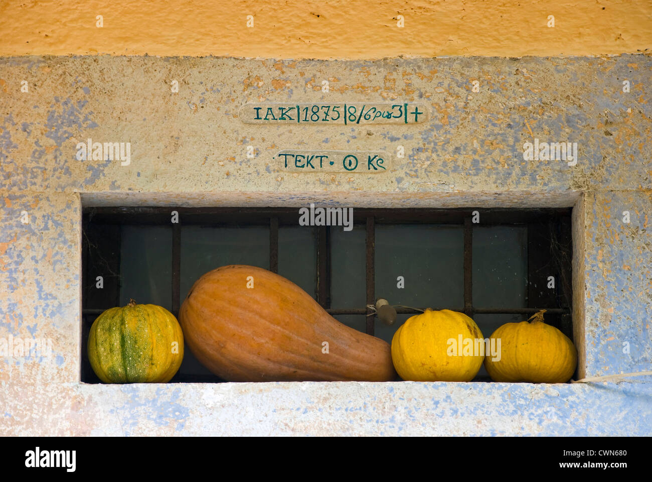 Decorative detail with pumpkins above a front door on Pelion Peninsular, Thessaly, Greece Stock Photo