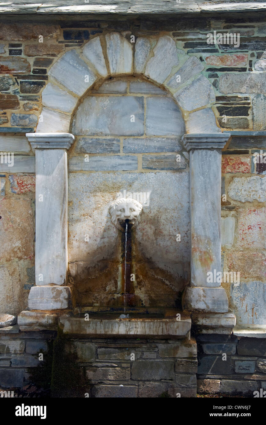 Spring drinking fountain in Agios Georgios, Pelion Peninsular, Thessaly, Greece Stock Photo