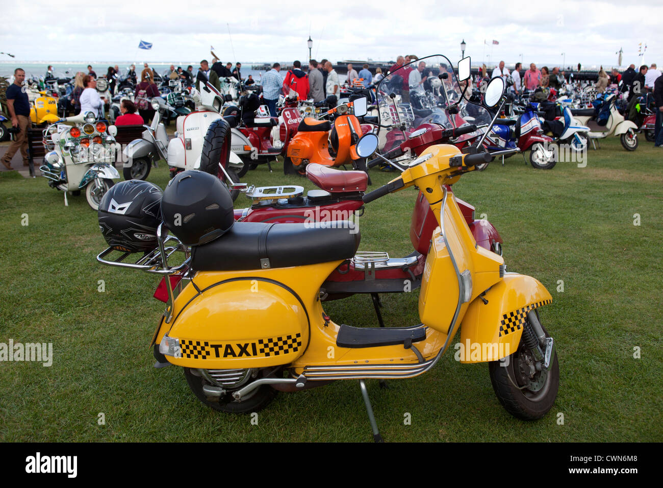 Vespa painted like yellow  taxi cab at International Scooter Rally Isle of Wight England UK Stock Photo