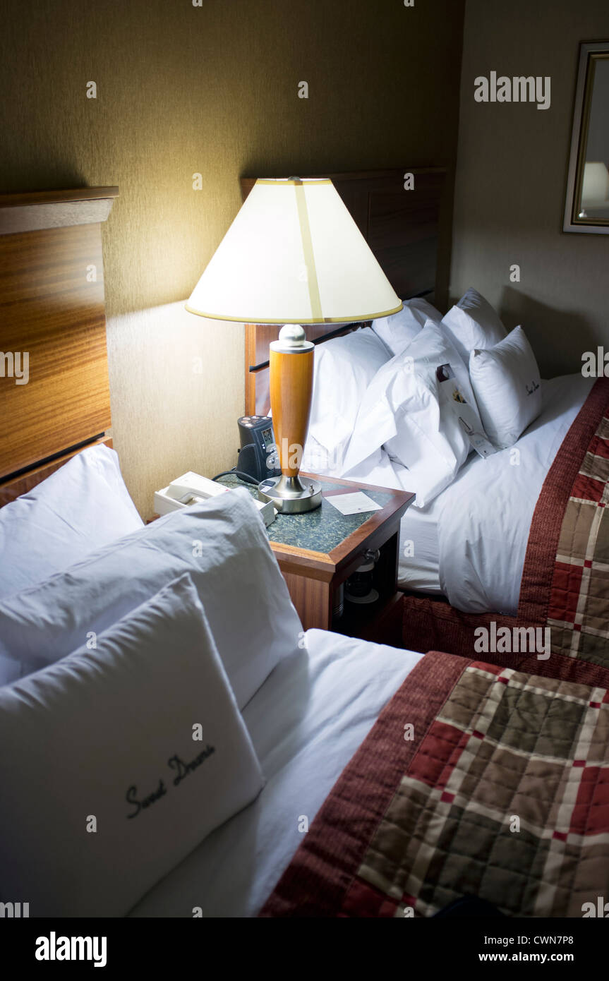 Hotel room with two double beds Stock Photo Alamy