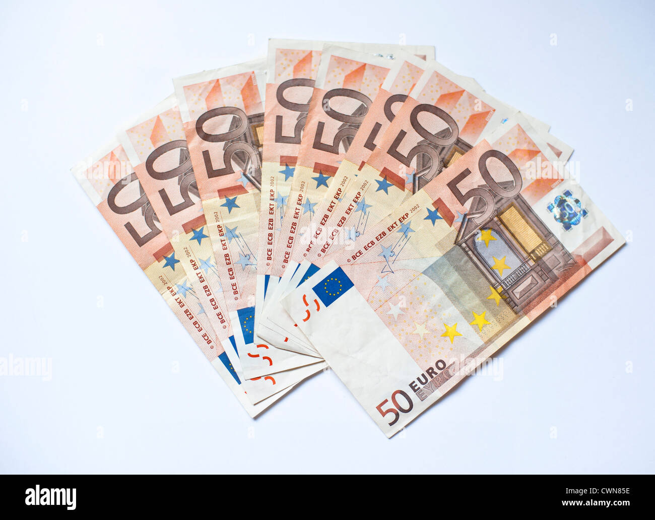 50 euro bills fanned out on a white background Stock Photo