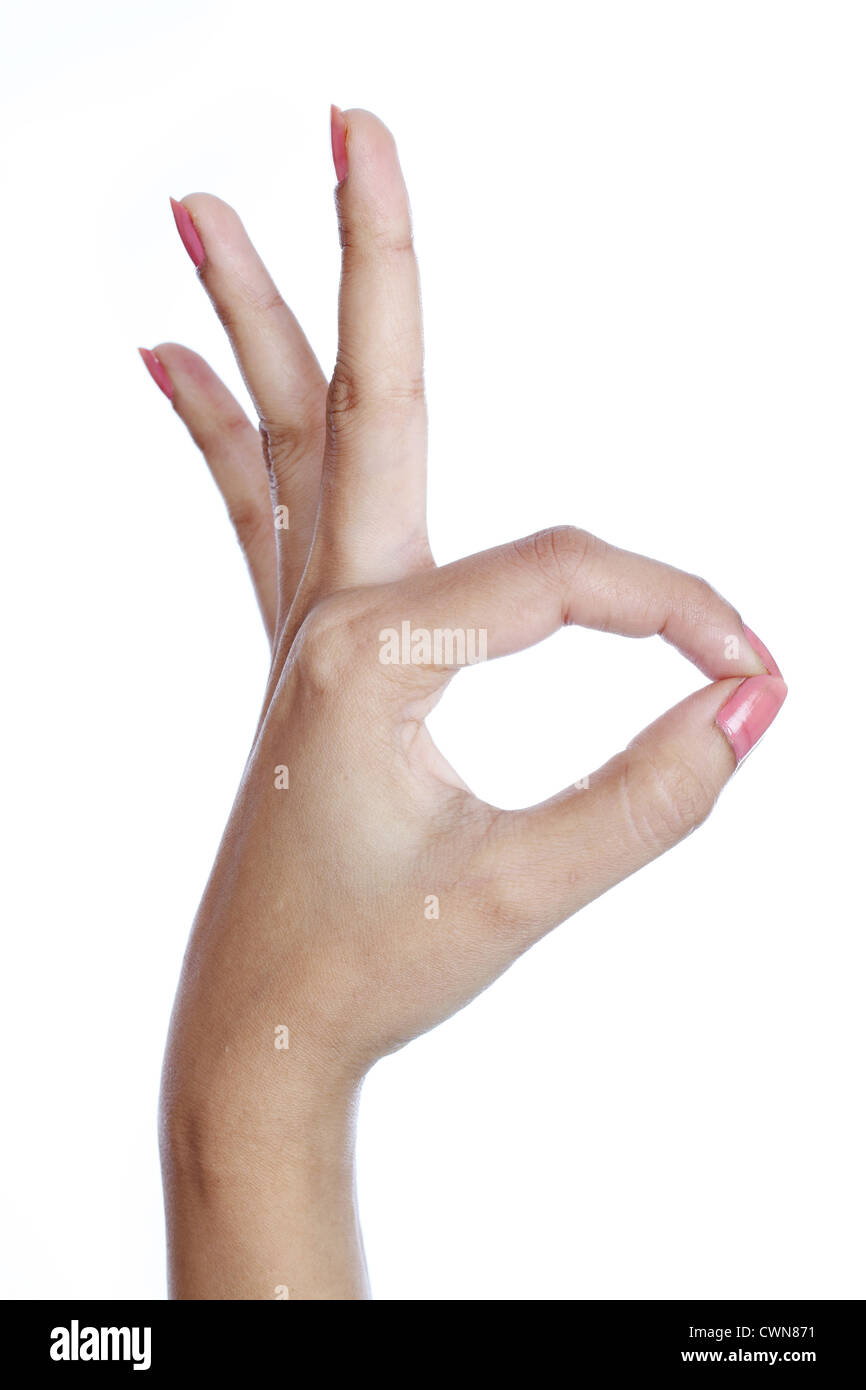 Hand OK sign against white background Stock Photo