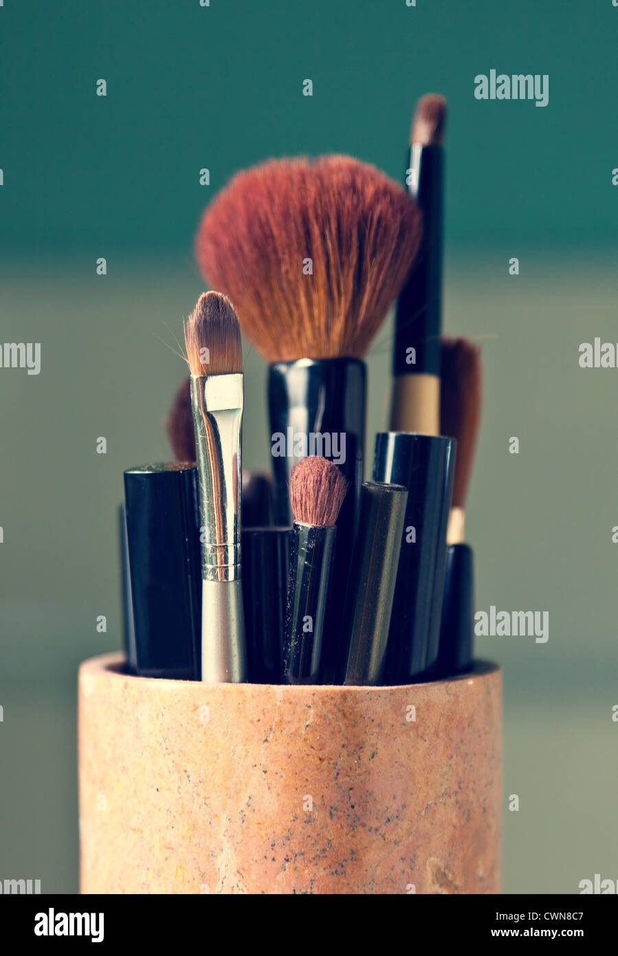 Makeup brushes in a jar Stock Photo