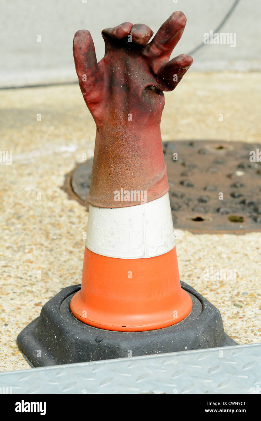 Rubber glove on traffic cone Stock Photo