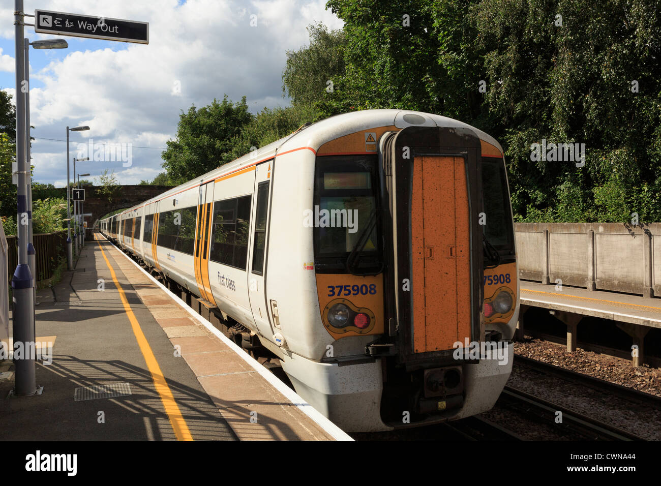 Rear of a Londonbound SouthEastern train departing from platform in