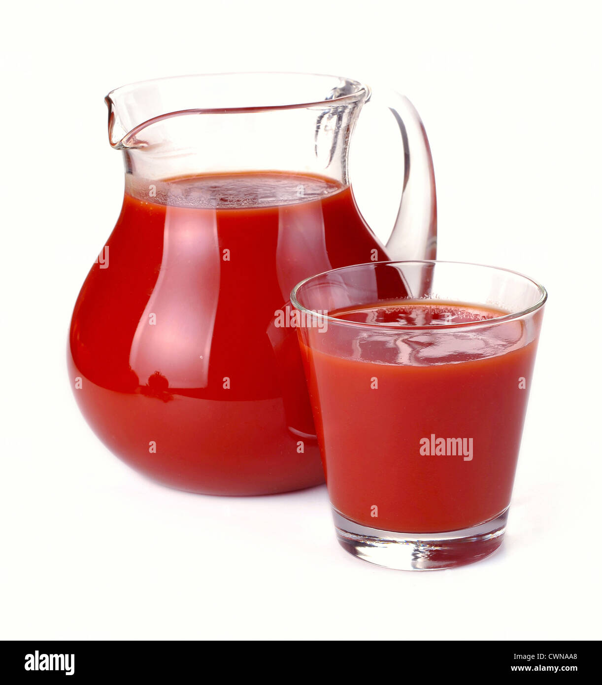 Red Juice In Glass Pitcher Jug Isolated On White Stock Photo