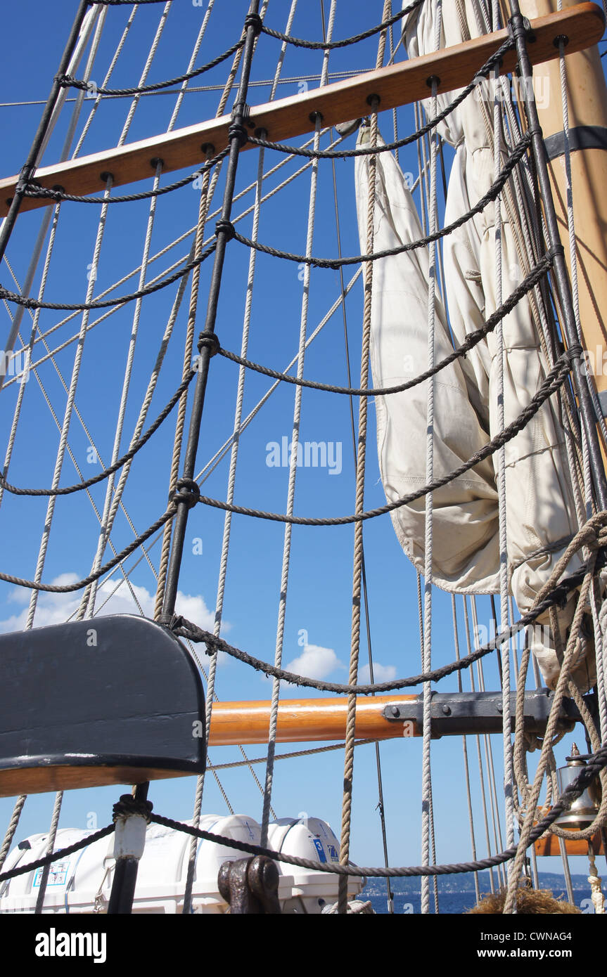Mast, yardarms, rigging and sails of tall ship near Kirkland