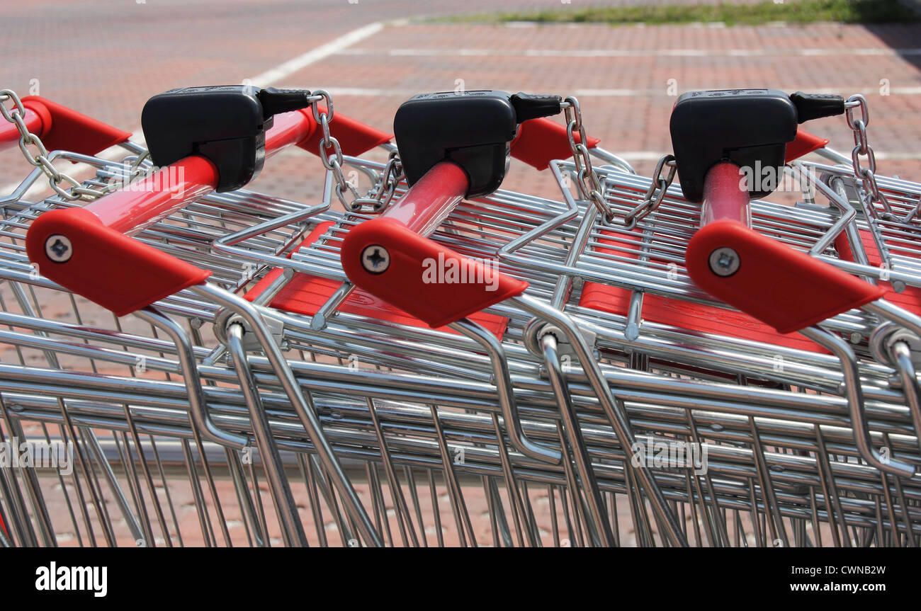 Set of stacked supermarket trolleys Stock Photo Alamy