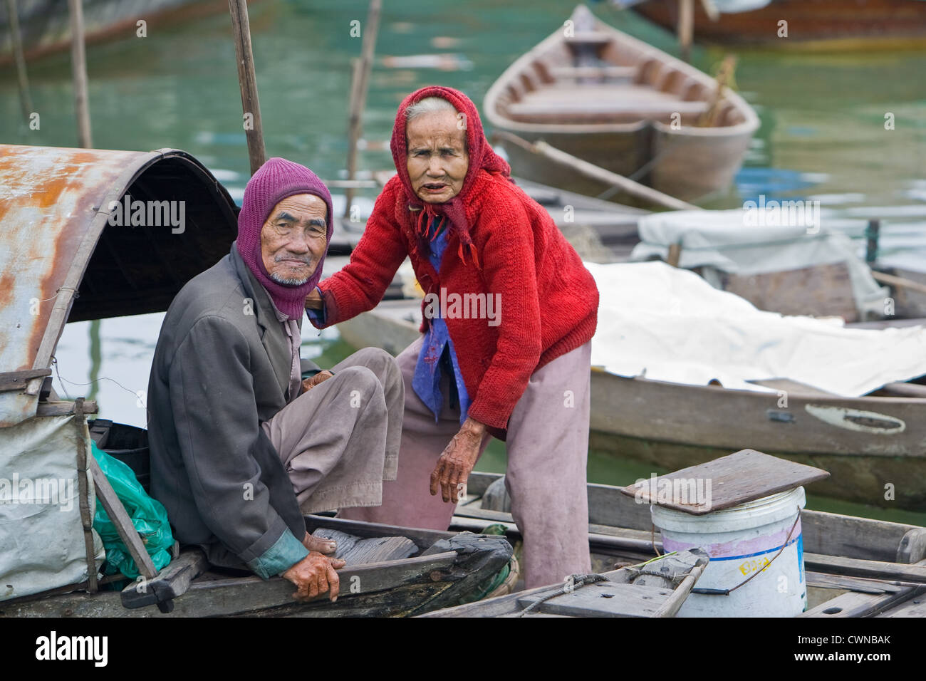 Man and wife living on a boat at Hoi An. Stock Photo