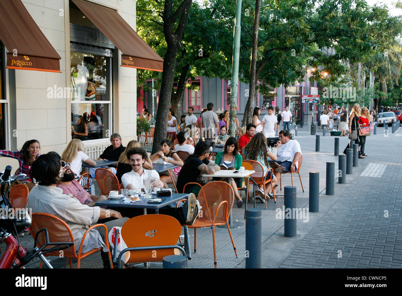 People sitting at an outdoors cafe in Palermo Soho, Buenos Aires, Argentina. Stock Photo
