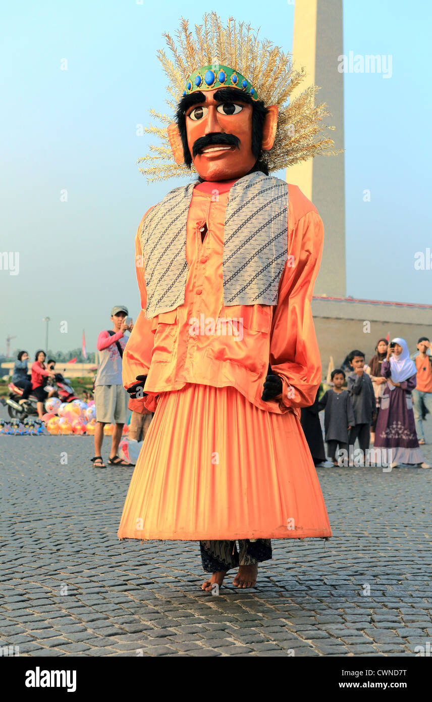 Ondel Ondel live human dancing puppet in Merdeka Square, Jakarta Stock Photo