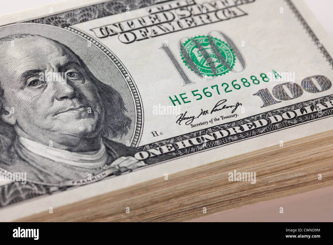 A stack of one hundred dollar bills Stock Photo