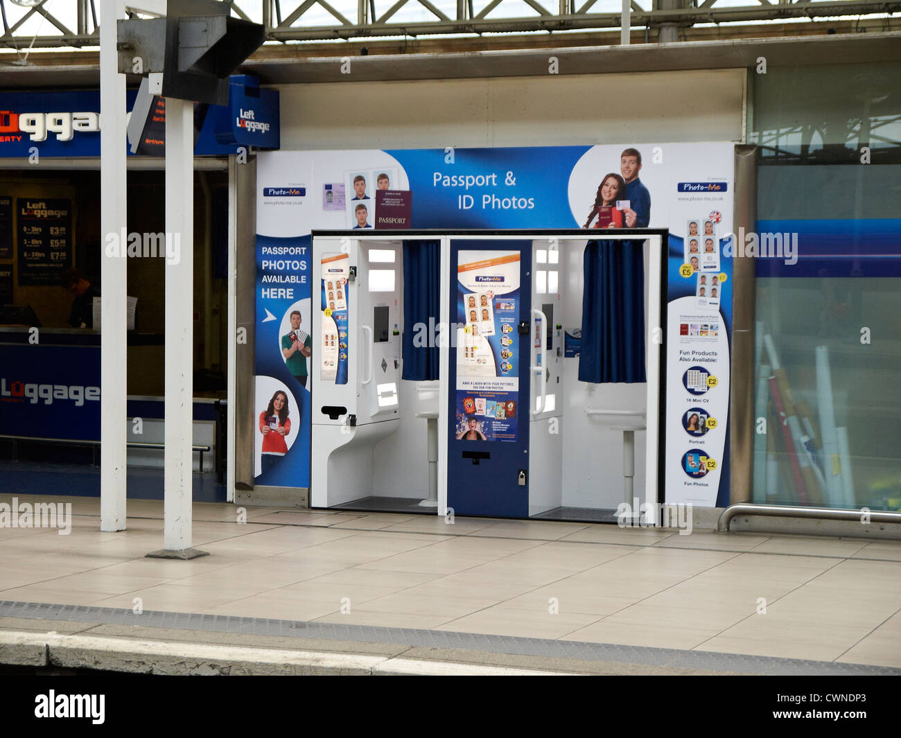 Passport photo booth on Piccadilly railway station in Manchester UK Stock Photo