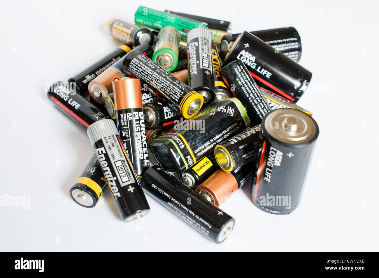 A pile of dead batteries on a white background Stock Photo