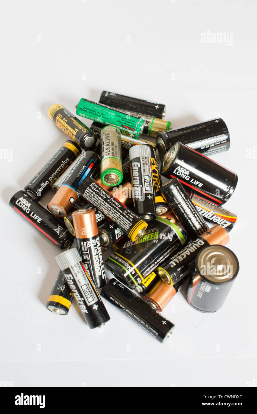 A pile of dead batteries on a white background Stock Photo