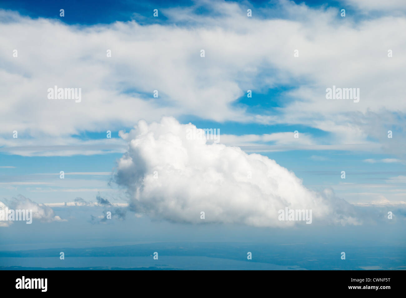 Blue sky with clouds under faraway earth Stock Photo - Alamy