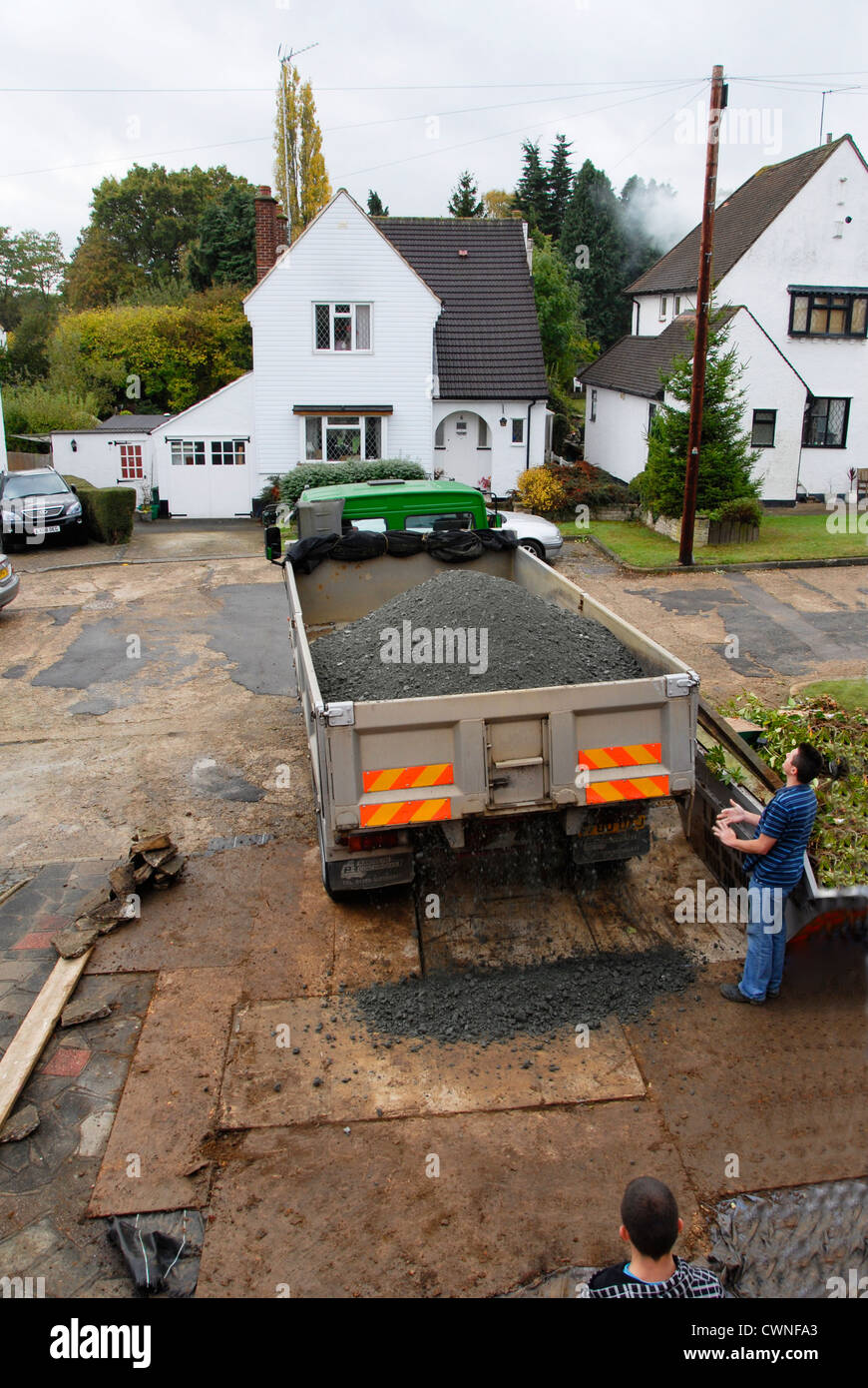 Tipper lorry unloading aggregate Stock Photo