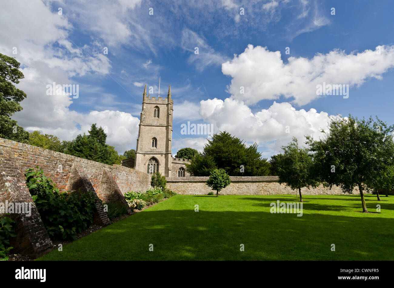Avebury Wiltshire church with manor house walled garden Stock Photo