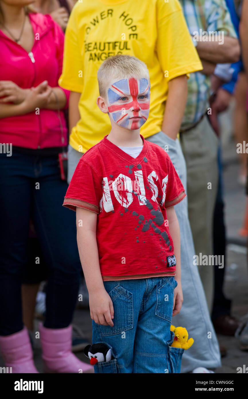 Young boy with Union Jack painted on his face at the annual World