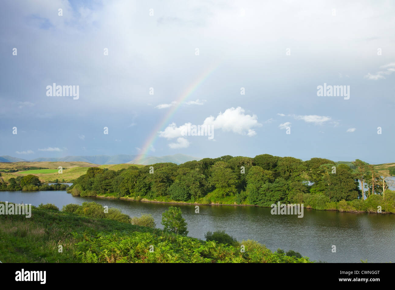 rainbow over a lake Stock Photo