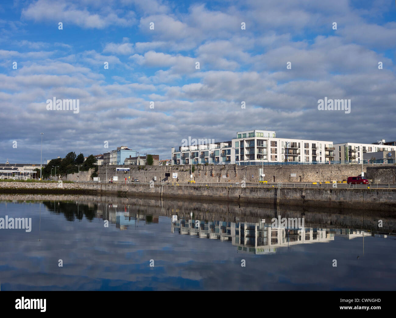 Reflections at Millbay Inner Basin, early morning at high tide, Plymouth, Devon UK Stock Photo