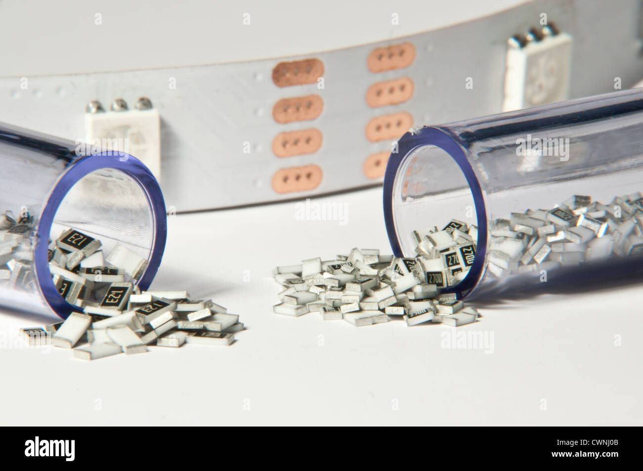 Small electronic components in tubes Stock Photo Alamy