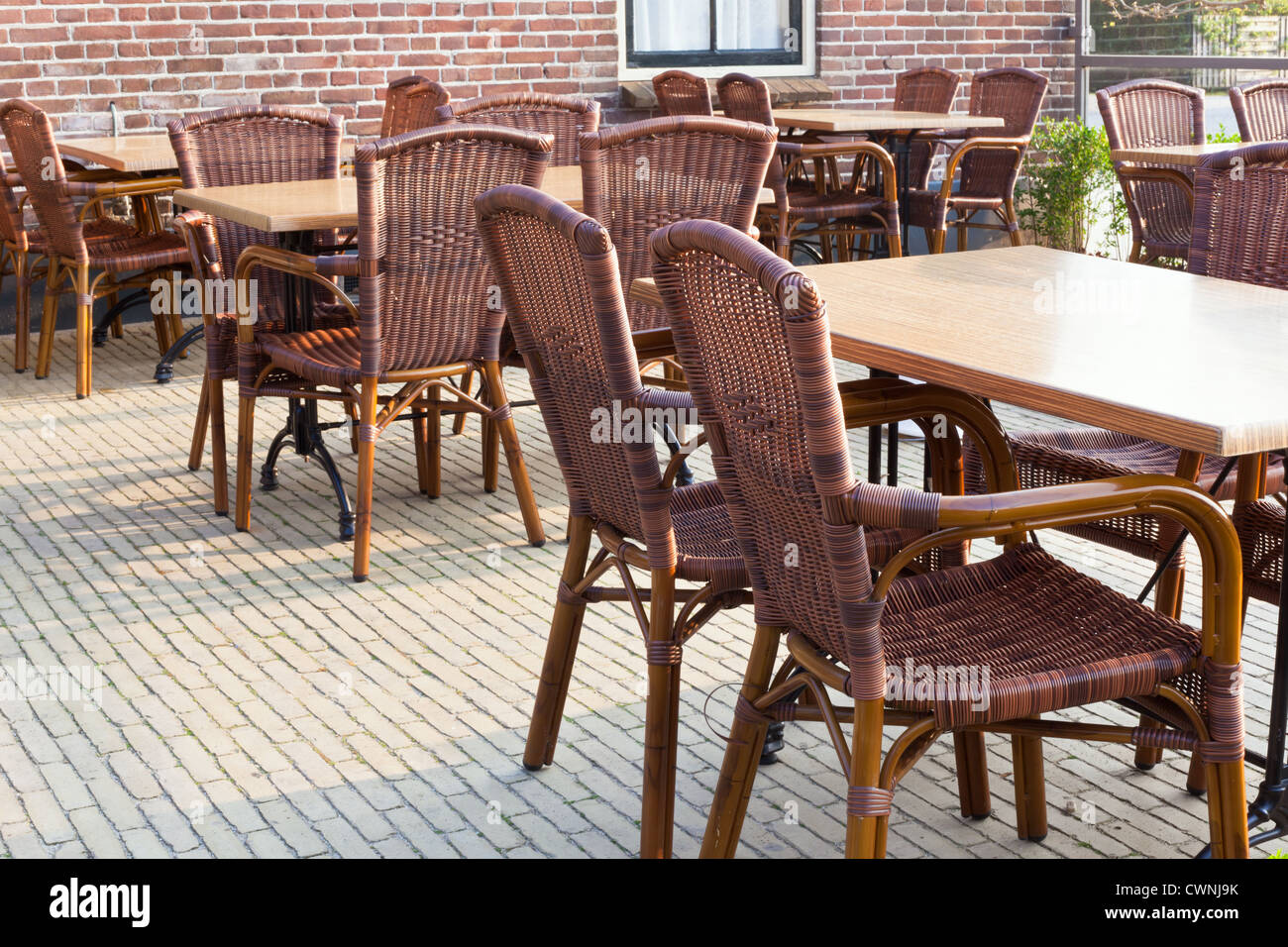 Outdoor Summer Cafe With Wicker Furniture Horizontal Shot Stock