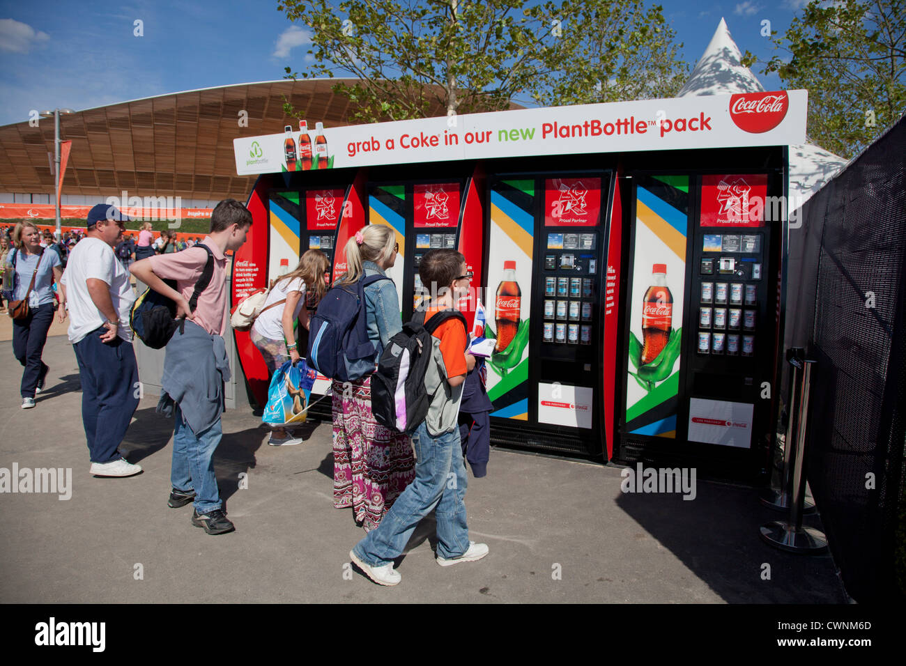 Spectators use Coca Cola vending machine at the London 2012 Olympic Stadium Stock Photo Alamy