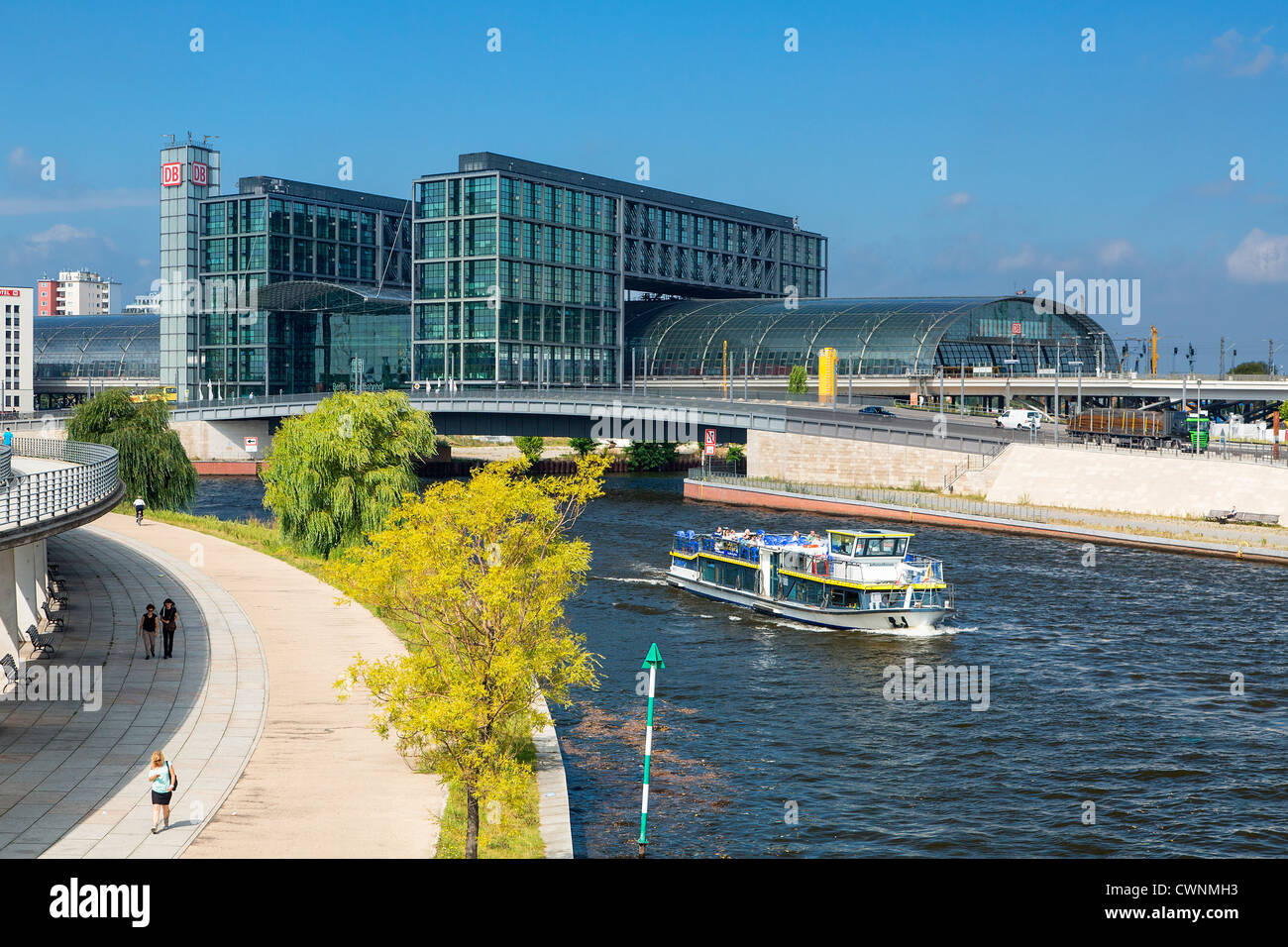Europe, Germany, Berlin, A tour boat on the Spree River, on the background the Berlin Hauptbahnhof (Central Station) Stock Photo