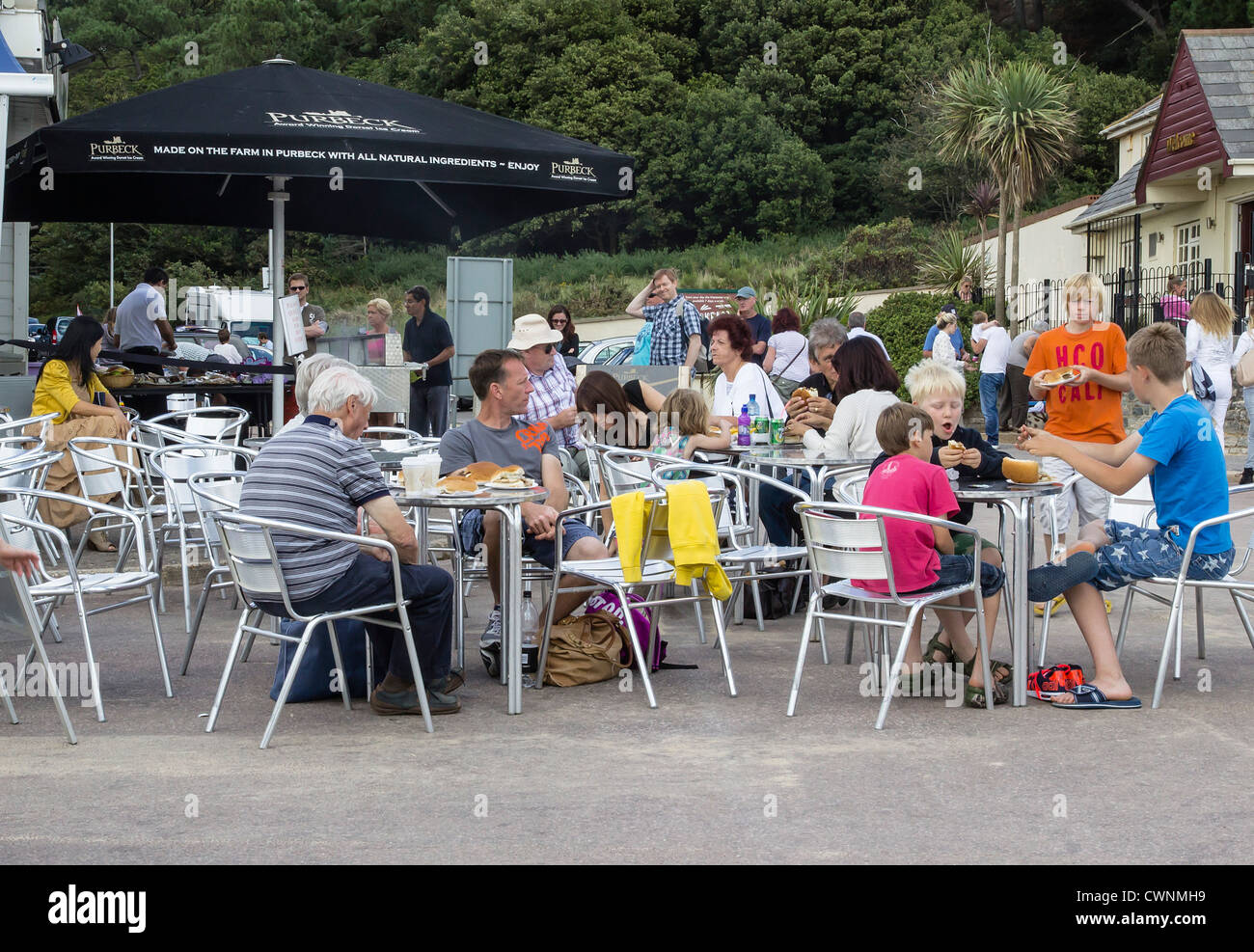 Promenade Cafe with customers dining al fresco, Bournemouth, UK Stock Photo