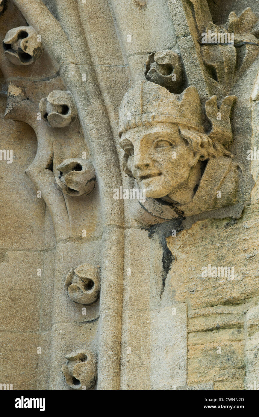 Carved stone mans head on the tower of the University Church of St Mary the Virgin, Oxford, England Stock Photo