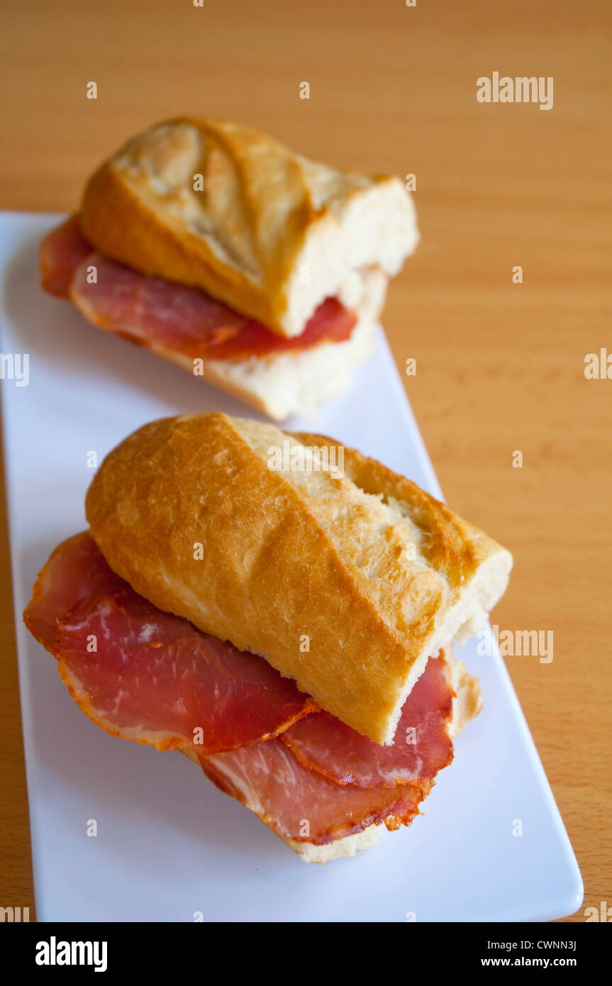 Spanish tapa: Iberian loin sandwich Stock Photo - Alamy