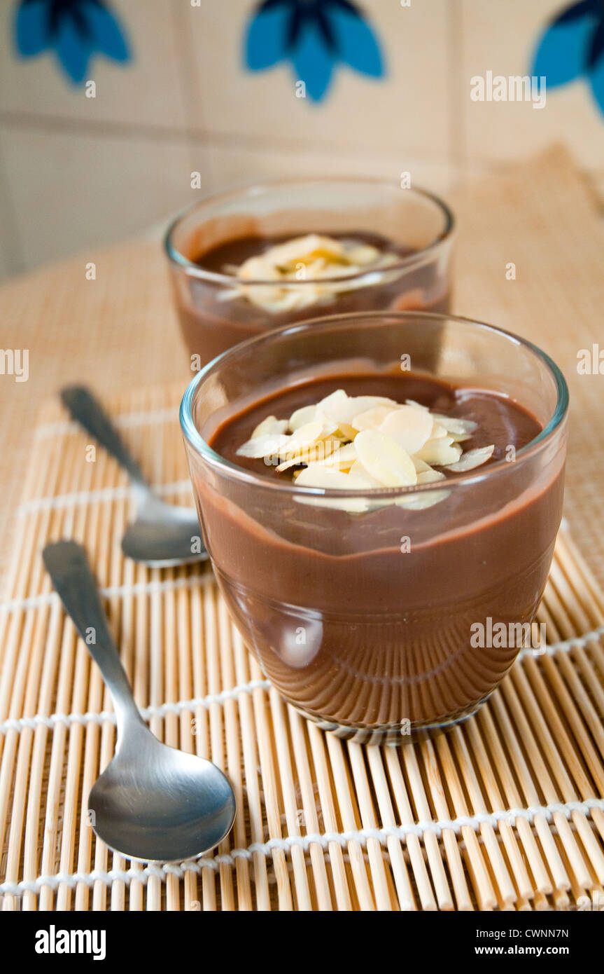Dessert: chocolate mousse with almonds. Stock Photo