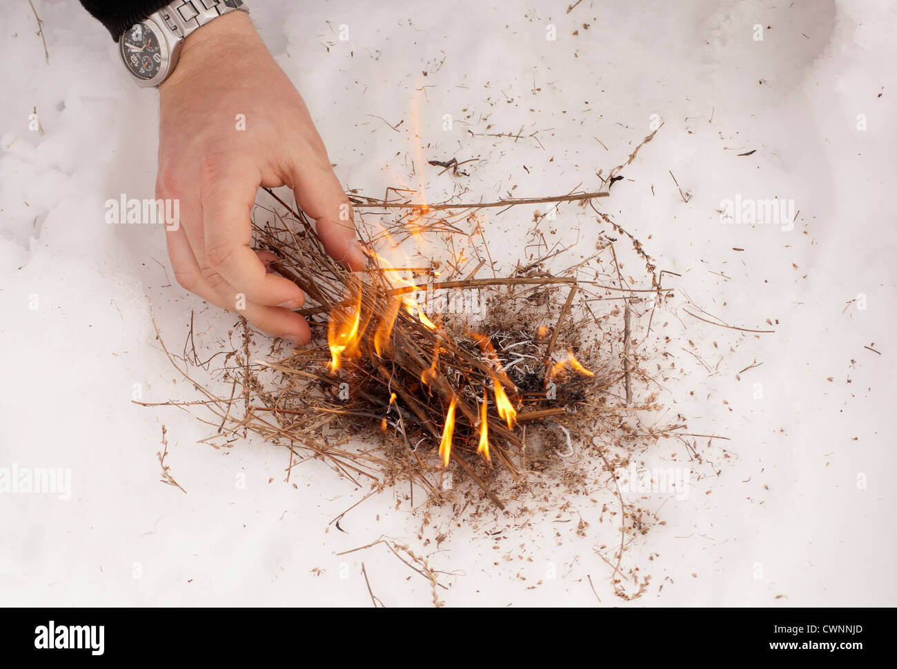 Lighting a fire Stock Photo