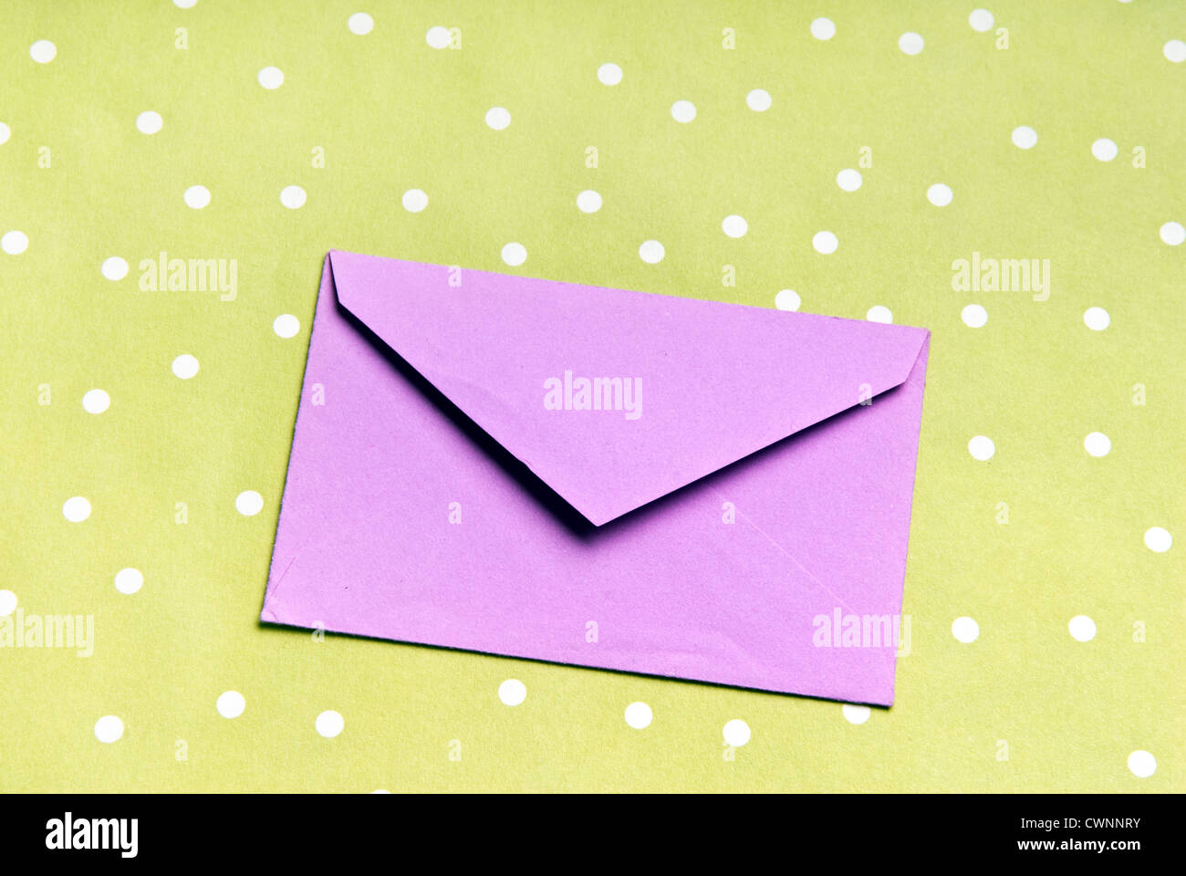Envelope on gift wrapping paper Stock Photo